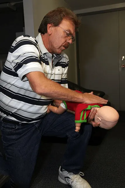 Group of students learning first aid